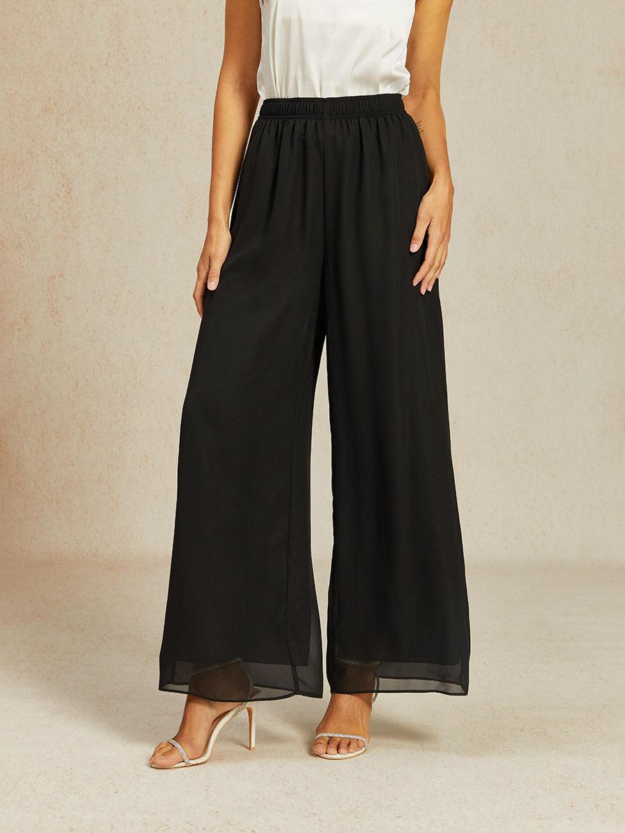 Pantalon uni à jambe large et taille haute