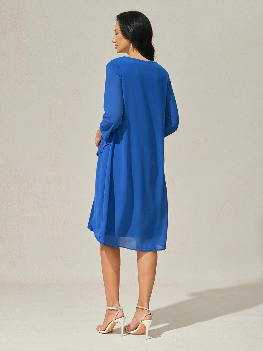 Robe en mousseline de soie verte à manches cape superposées