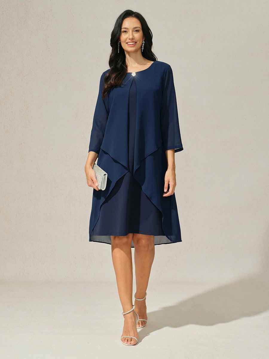Robe en mousseline de soie verte à manches cape superposées