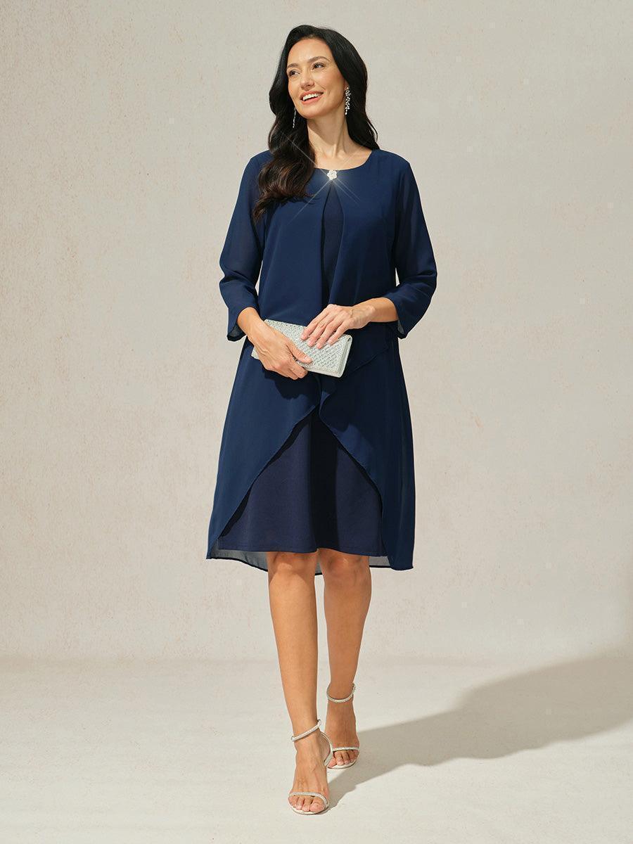 Robe en mousseline de soie verte à manches cape superposées