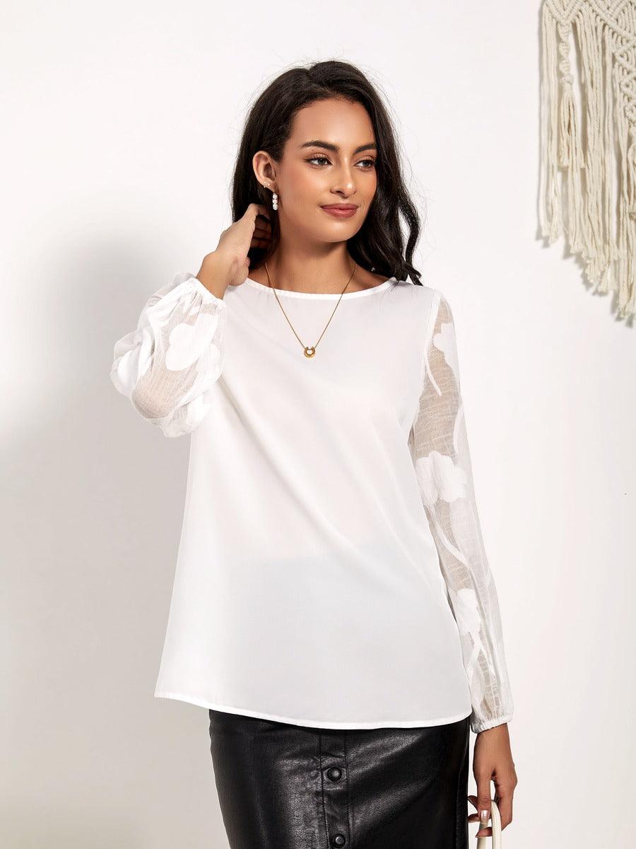 Bluse mit Rundhalsausschnitt und halblangen Ärmeln und Patchwork-Spitze