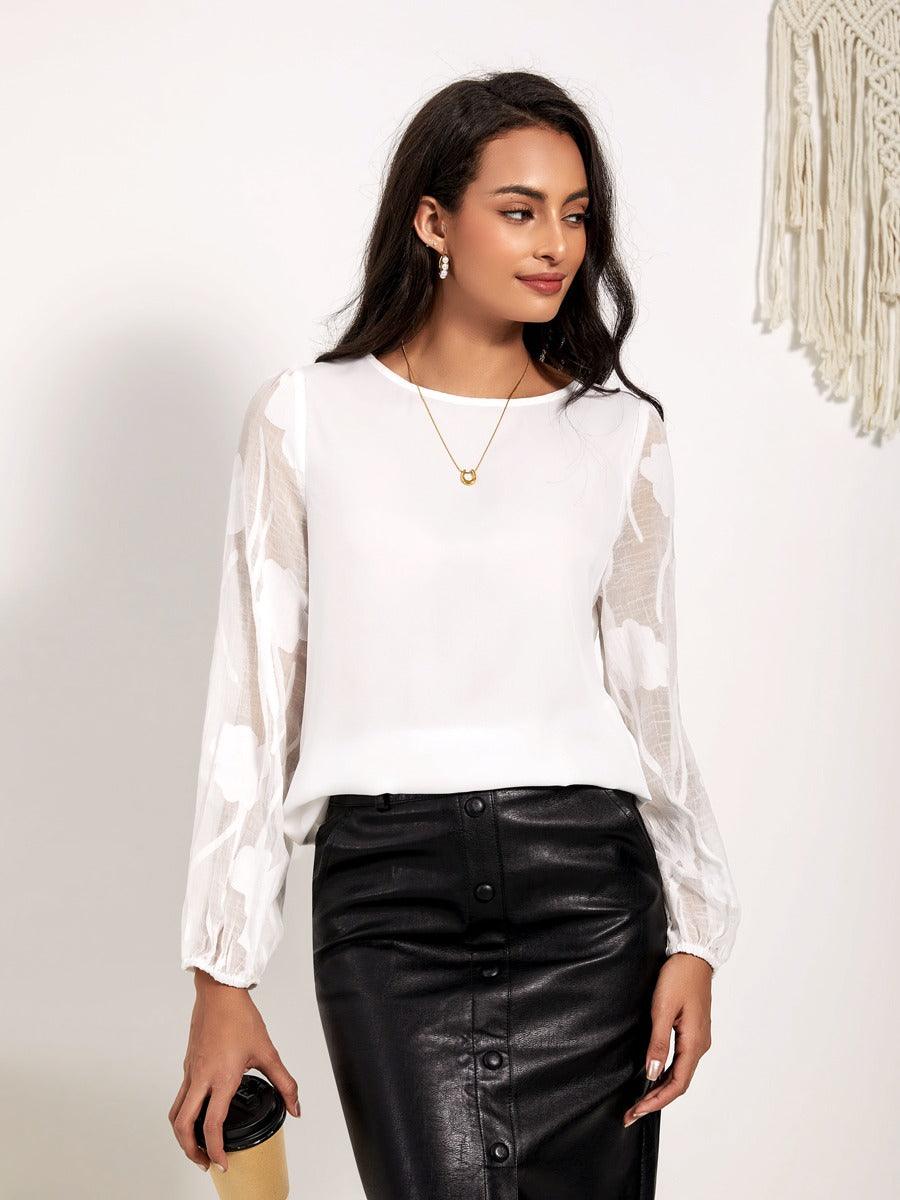 Bluse mit Rundhalsausschnitt und halblangen Ärmeln und Patchwork-Spitze