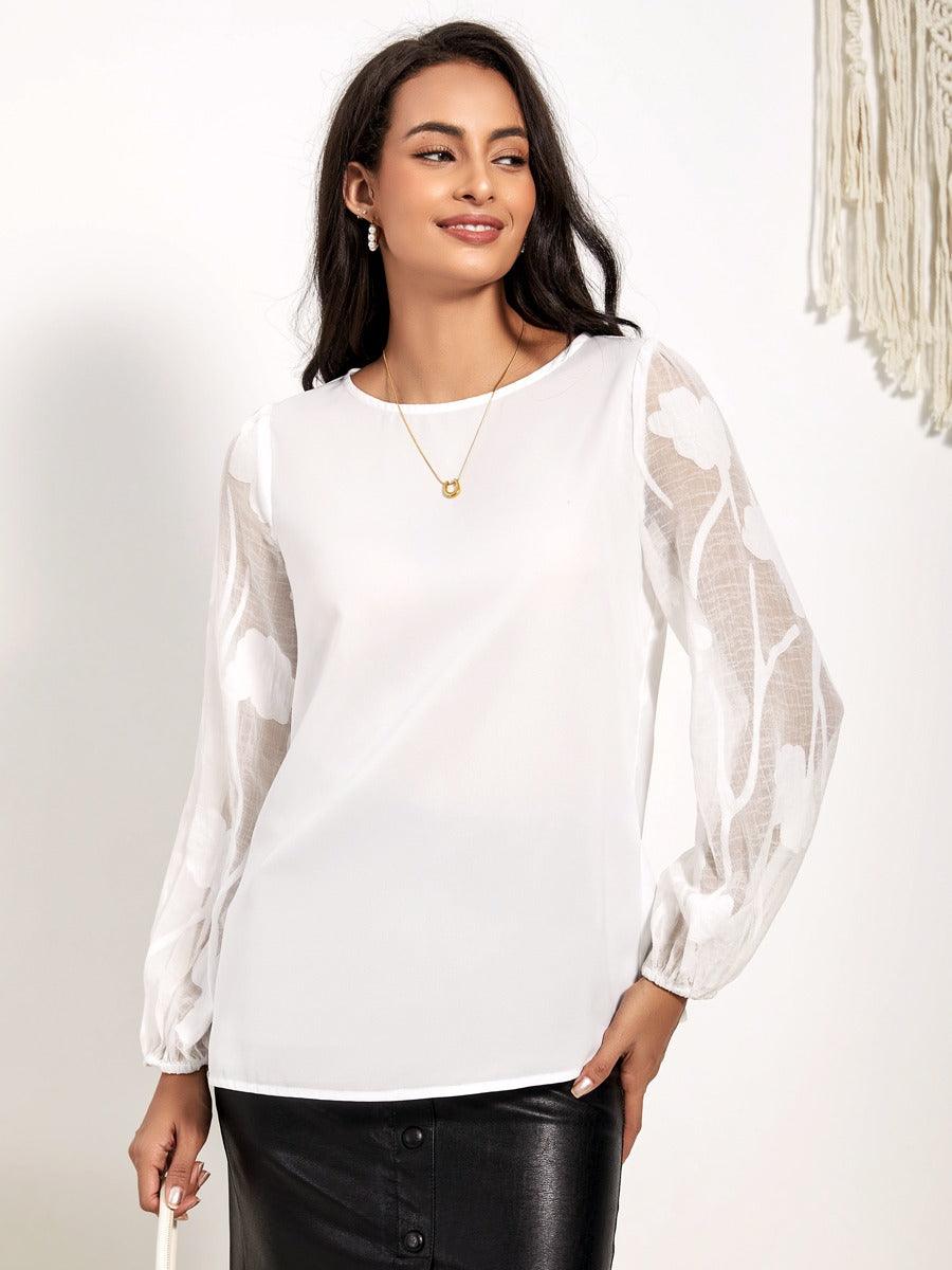 Bluse mit Rundhalsausschnitt und halblangen Ärmeln und Patchwork-Spitze