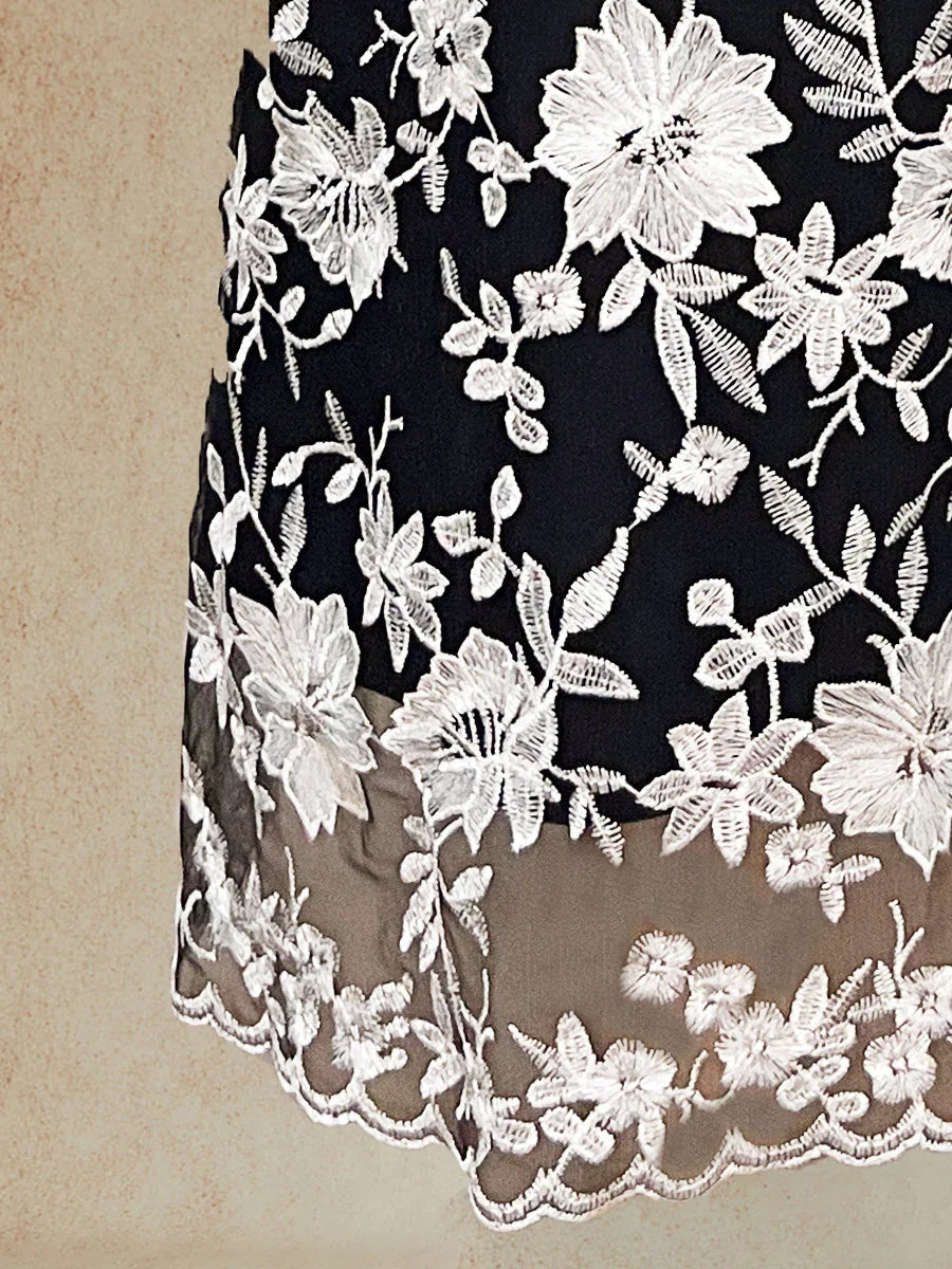 Chaqueta larga de encaje bordada con flores