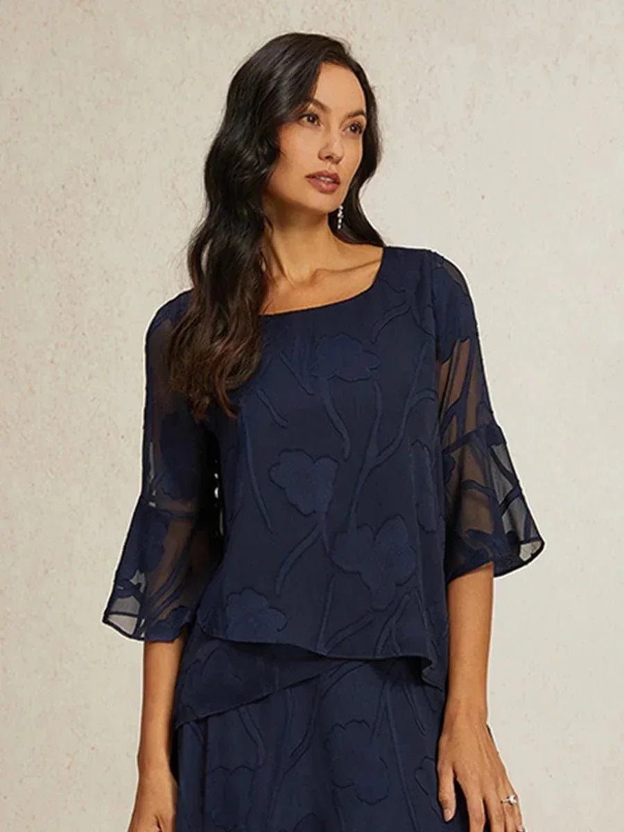 Elegante Chiffonbluse mit asymmetrischem Saum