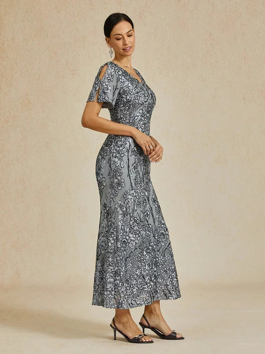 Elegantes Paillettenkleid mit V-Ausschnitt und kalten Schultern