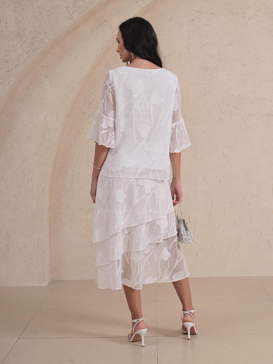 Blusa elegante de gasa con dobladillo asimétrico