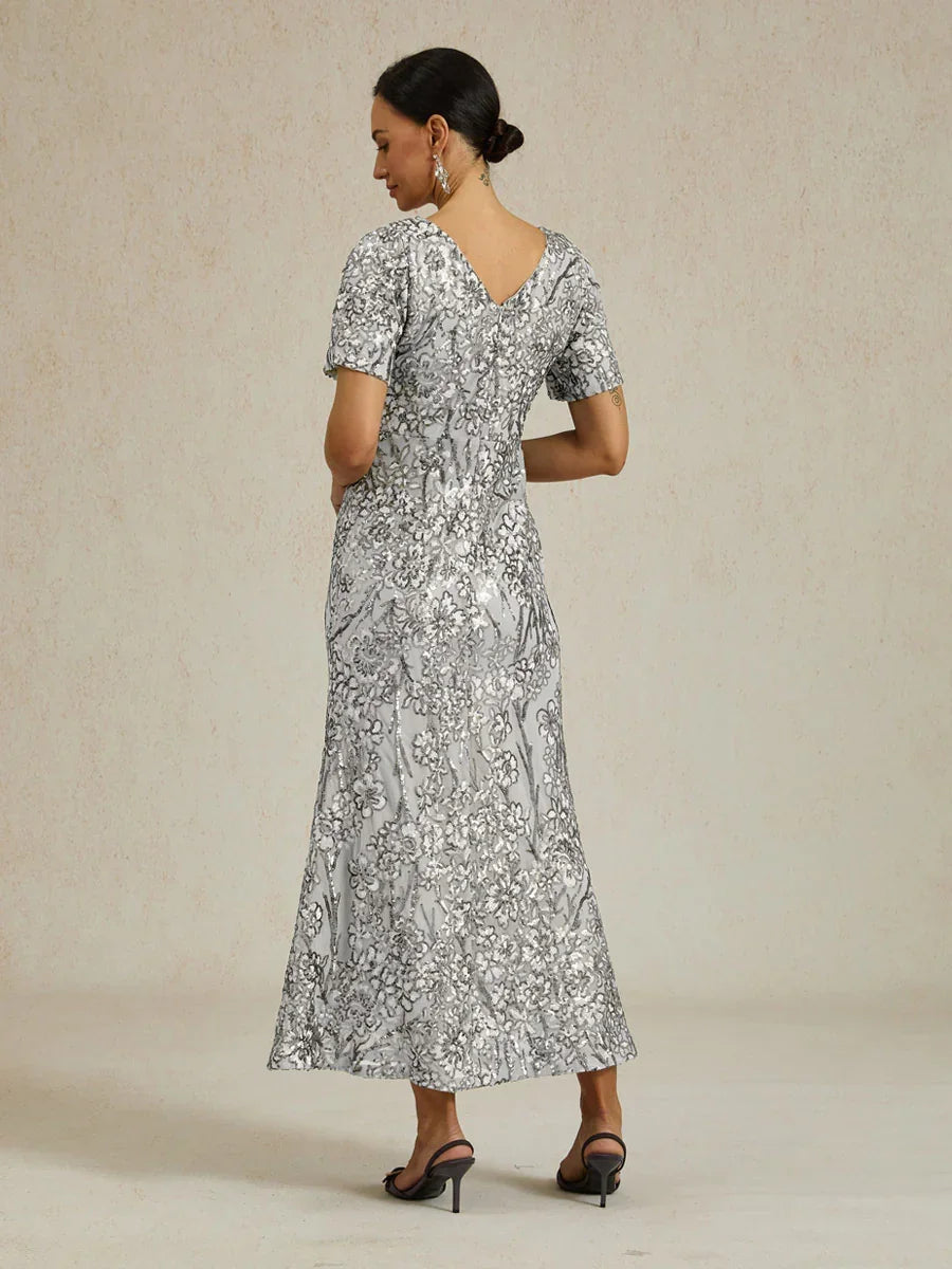Elegantes Paillettenkleid mit V-Ausschnitt und kalten Schultern