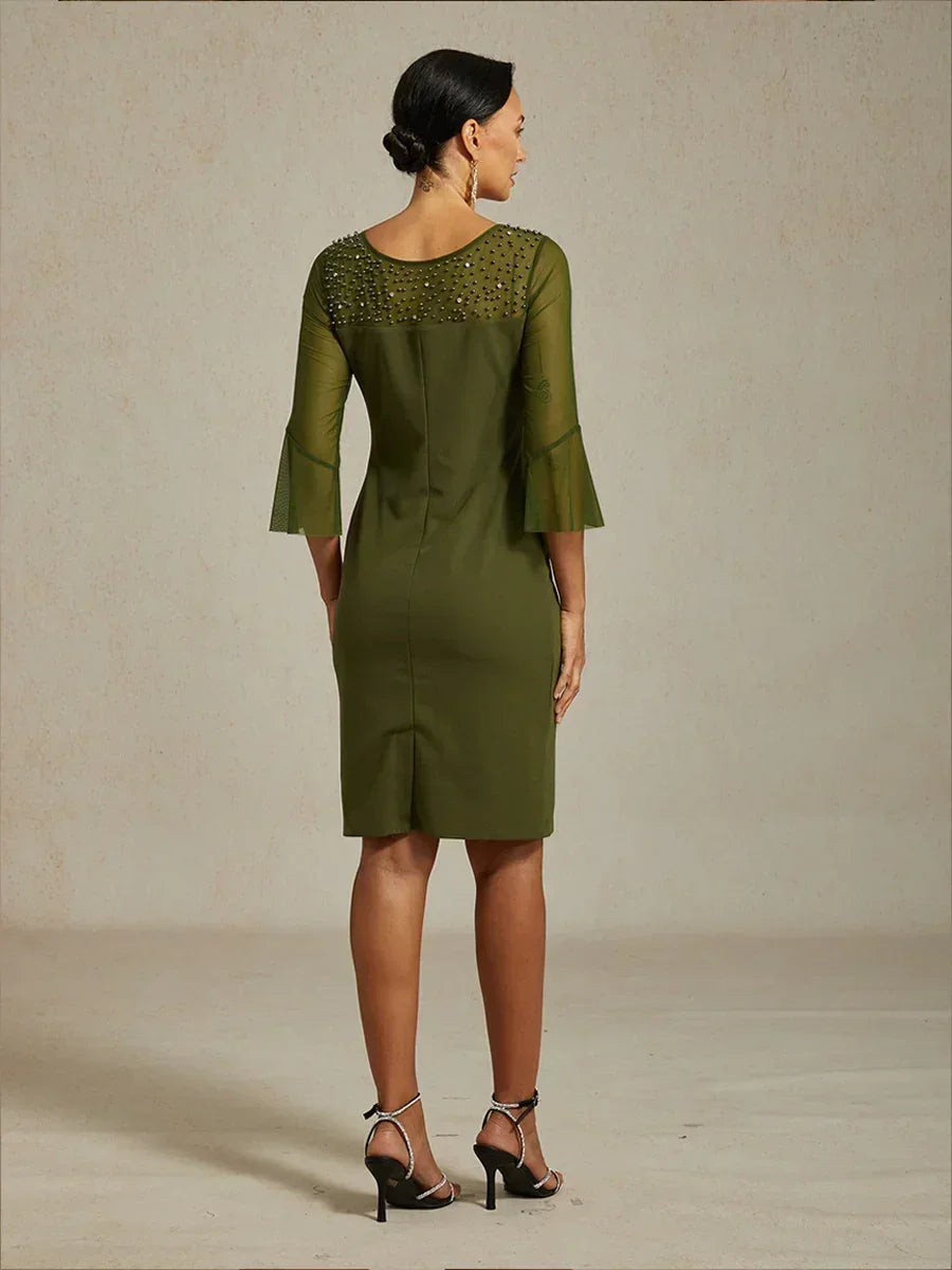 Robe de cocktail fourreau élégante avec décolleté en maille illusion orné