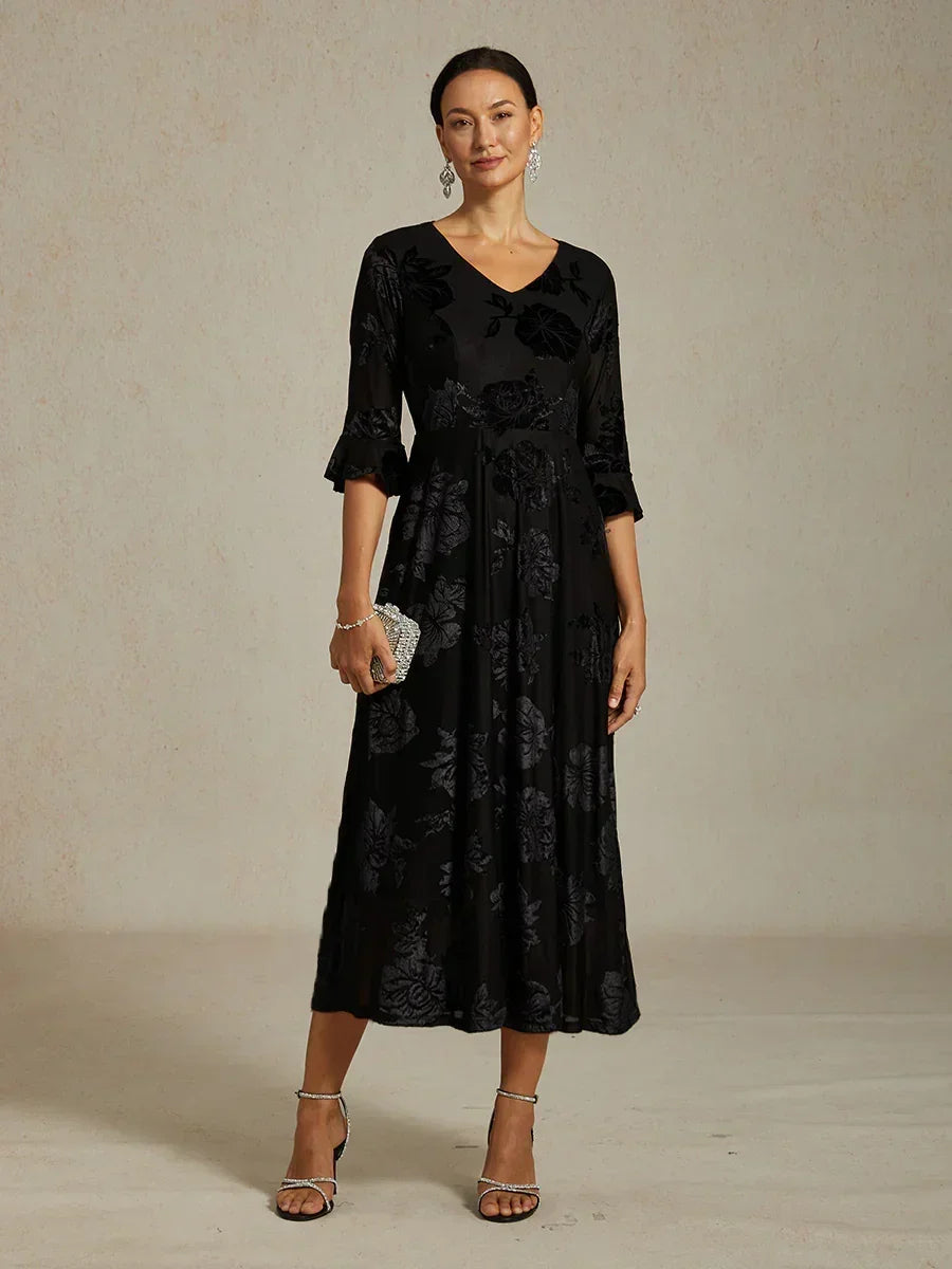 Maxikleid mit Rüschen und flatternder Spitze