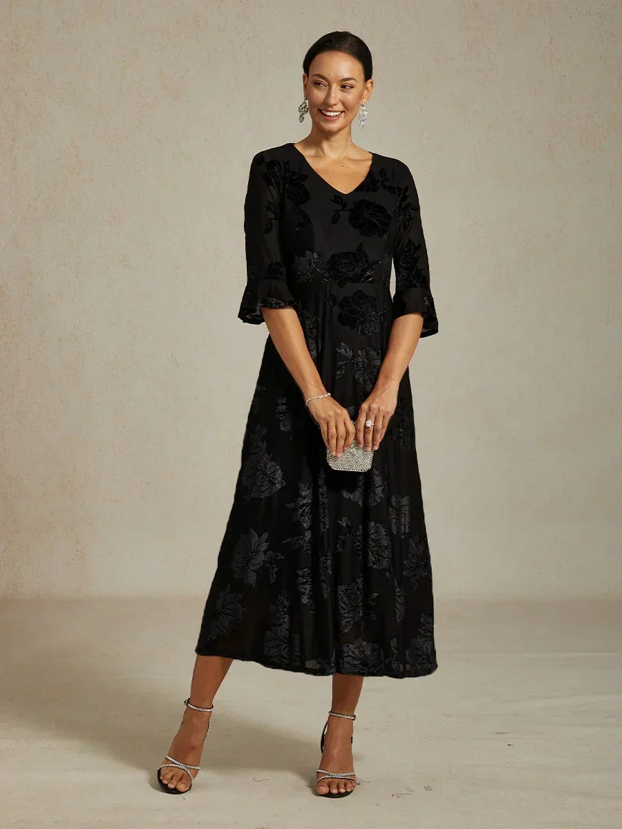 Maxikleid mit Rüschen und flatternder Spitze