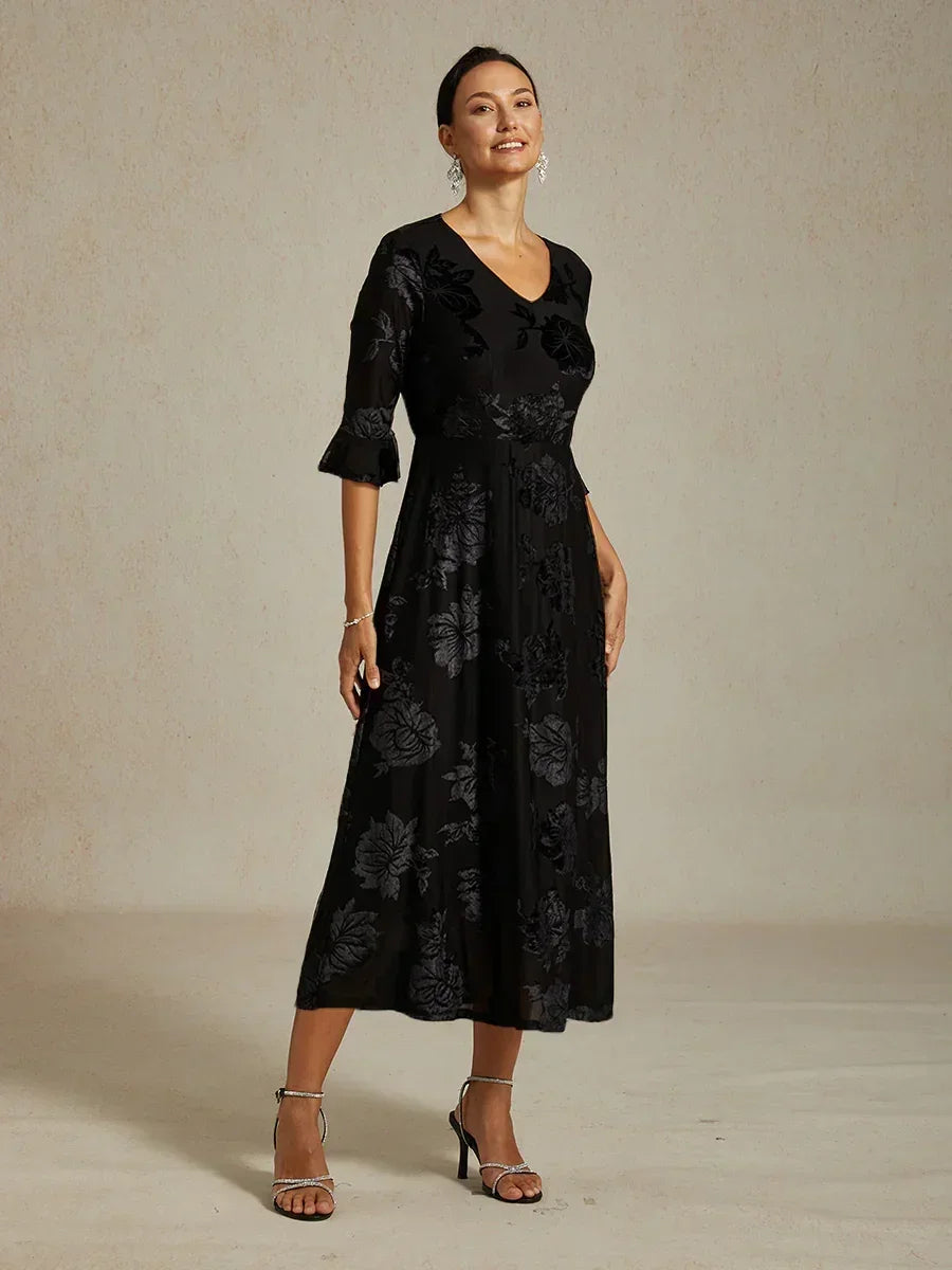 Maxikleid mit Rüschen und flatternder Spitze
