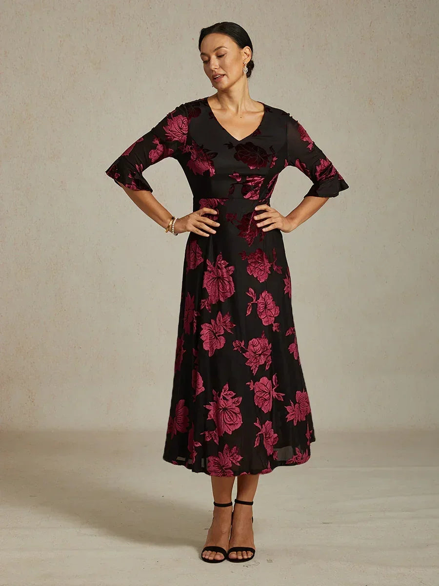 Maxikleid mit Rüschen und flatternder Spitze