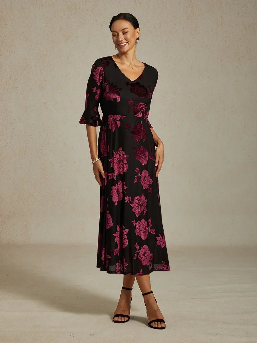 Maxikleid mit Rüschen und flatternder Spitze