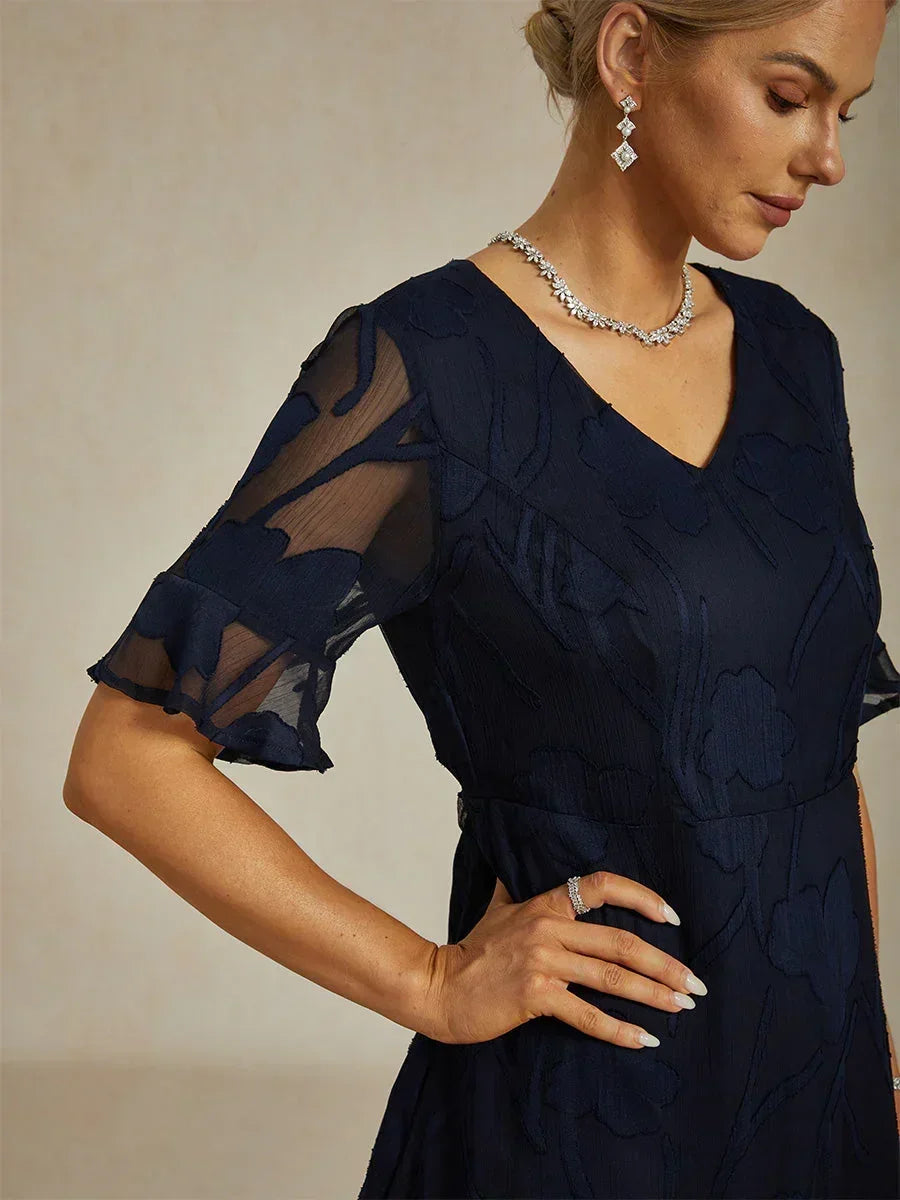 Maxikleid mit Rüschen und flatternder Spitze
