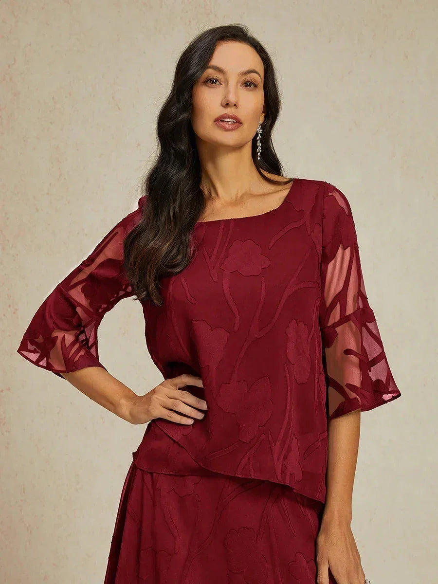 Elegante Chiffonbluse mit asymmetrischem Saum