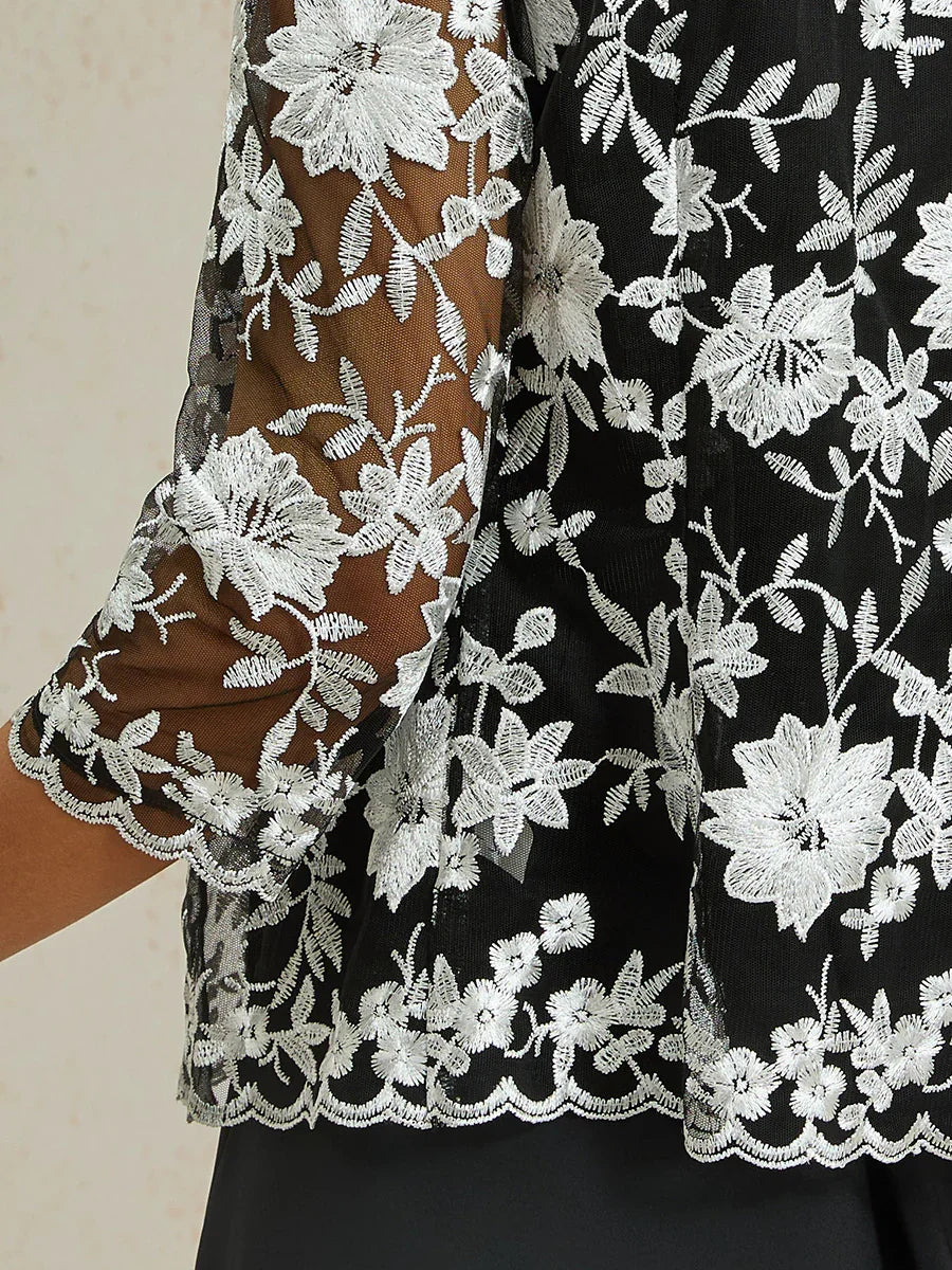 Spitzenjacke mit Blumenstickerei und Muscheldetail