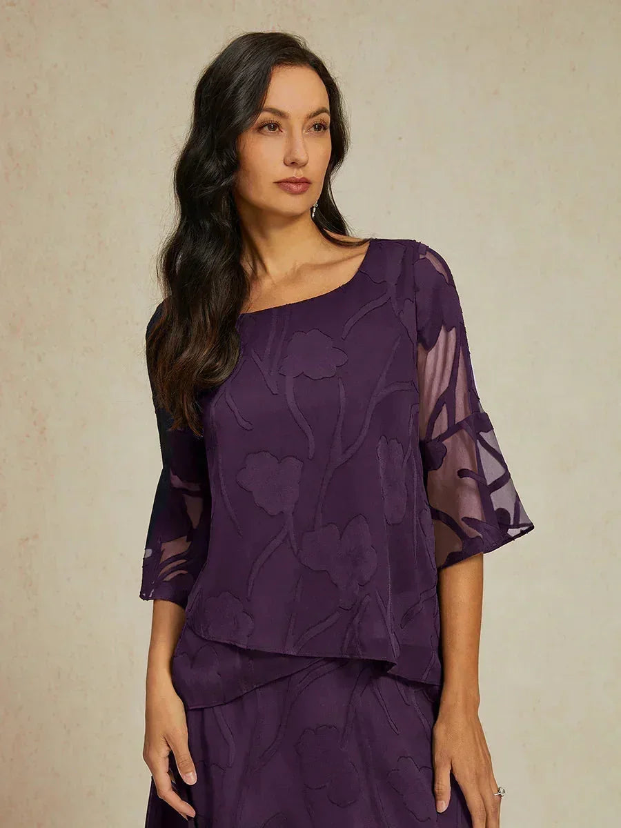 Elegante Chiffonbluse mit asymmetrischem Saum