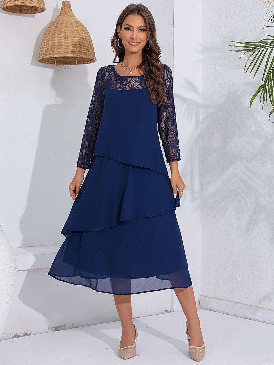 Robe en mousseline de soie à manches en dentelle superposées
