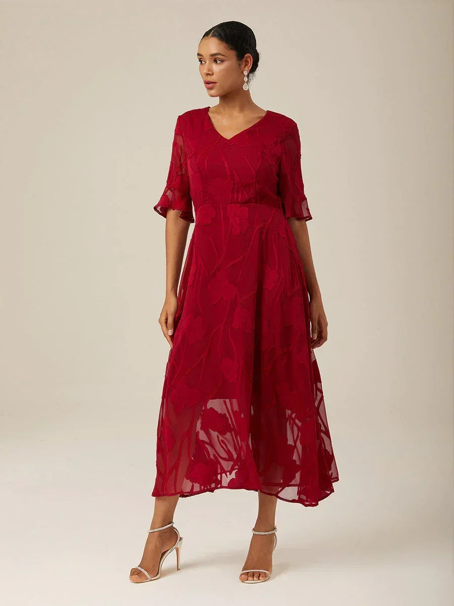 Maxikleid mit Rüschen und flatternder Spitze