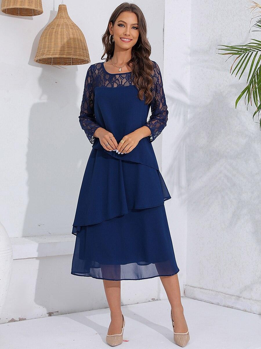 Robe en mousseline de soie à manches en dentelle superposées