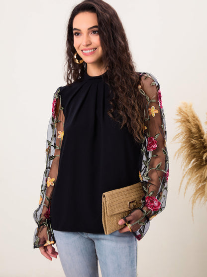 Bluse mit Rundhalsausschnitt und halblangen Ärmeln und Patchwork-Spitze