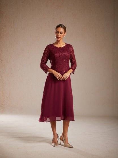 Elegantes Spitzen- und Chiffonkleid in Tea-Länge