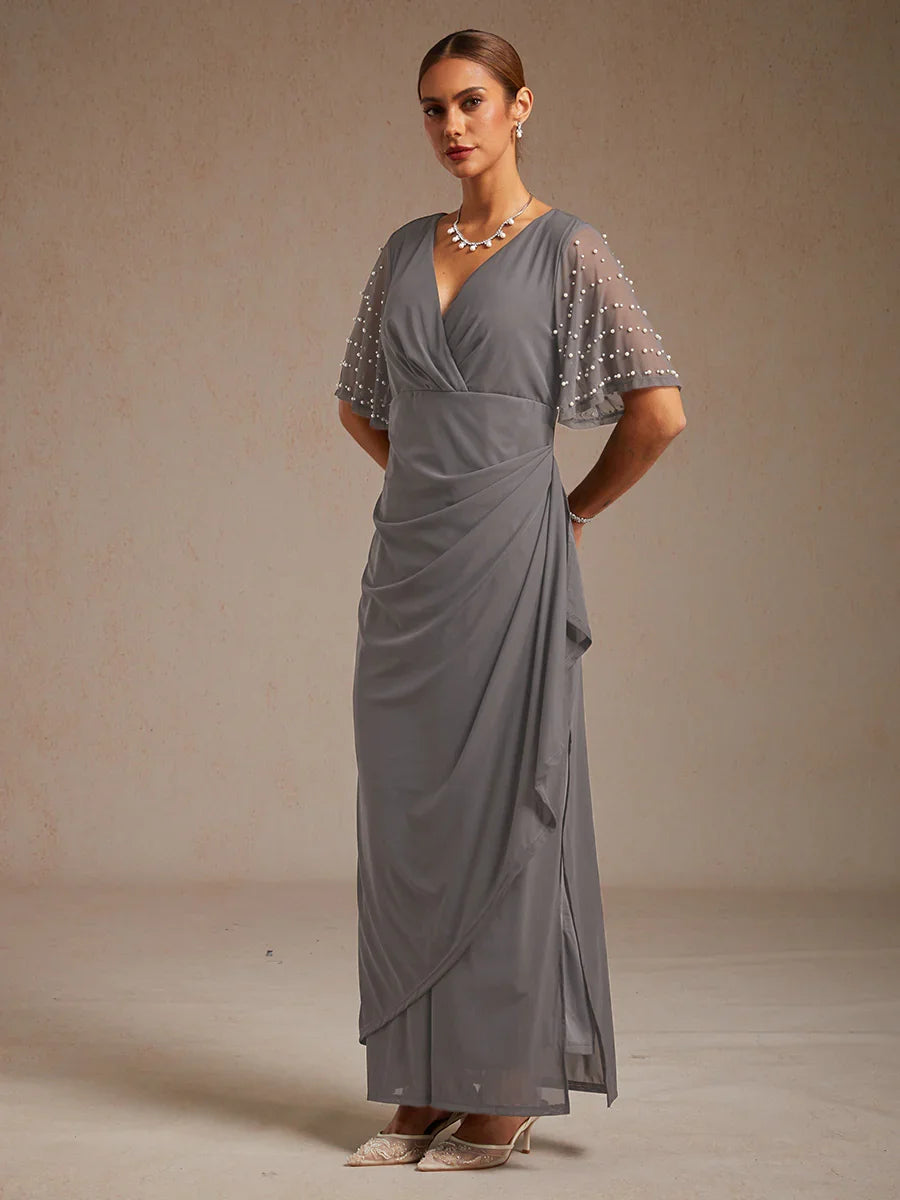 優雅正式禮服，配有裝飾性飄逸袖