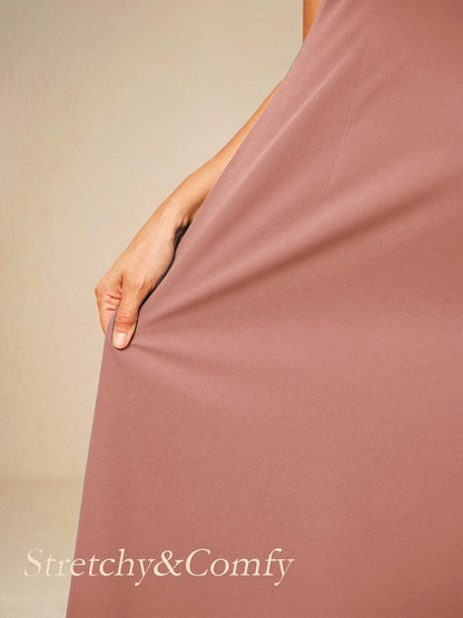 Robe en mousseline de soie verte à manches cape superposées