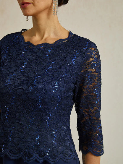 Vestido elegante de encaje y gasa a media pierna
