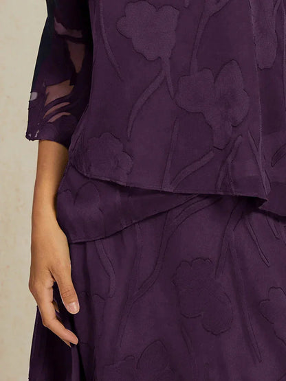 Elegante Chiffonbluse mit asymmetrischem Saum