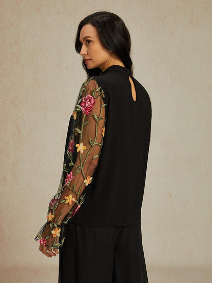 Bluse mit Rundhalsausschnitt und halblangen Ärmeln und Patchwork-Spitze