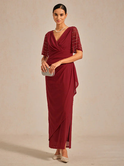 優雅正式禮服，配有裝飾性飄逸袖