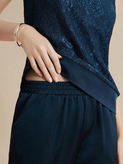 Pantalon uni à jambe large et taille haute