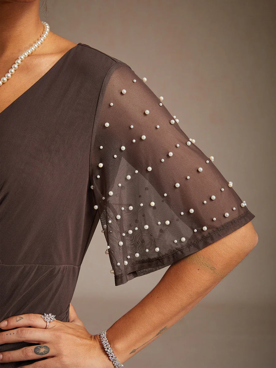 A-Linien-Kleid aus Rosettenspitze mit Paillettenverzierung