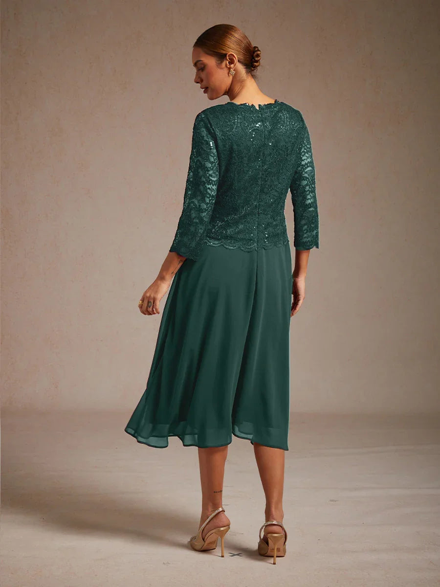 Vestido elegante de encaje y gasa a media pierna