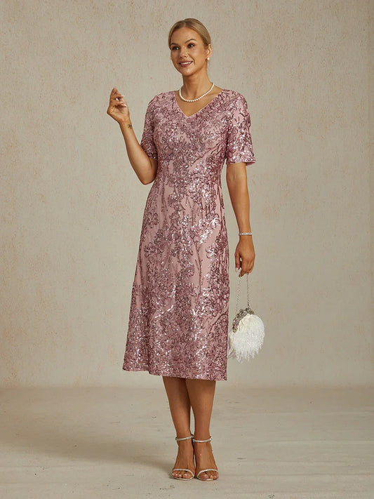 Elegantes Paillettenkleid mit V-Ausschnitt und kalten Schultern