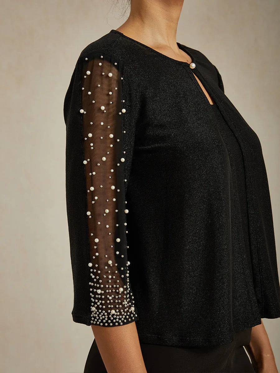 Elegante 3/4-Arm Metallic-Strickbluse