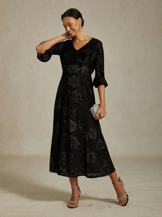 Maxikleid mit Rüschen und flatternder Spitze