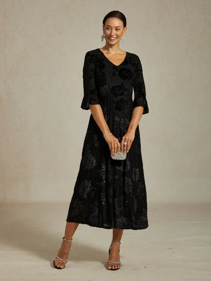 Maxikleid mit Rüschen und flatternder Spitze