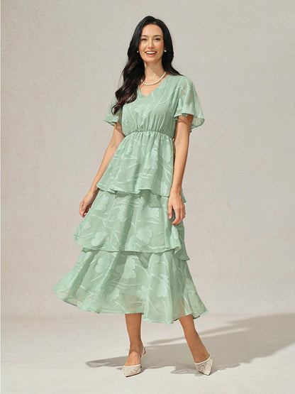 Robe volantée à col en V et dentelle