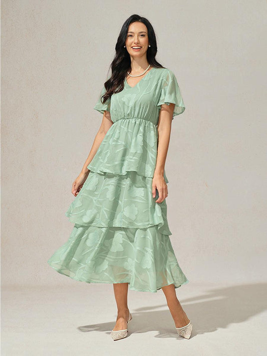Robe volantée à col en V et dentelle