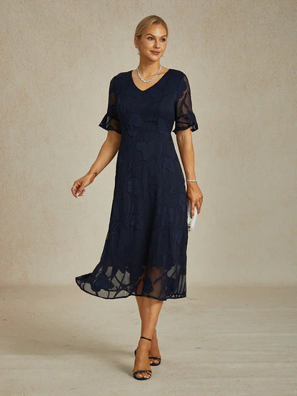 Maxikleid mit Rüschen und flatternder Spitze