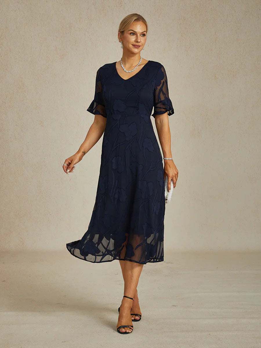 Maxikleid mit Rüschen und flatternder Spitze
