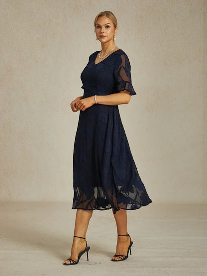 Maxikleid mit Rüschen und flatternder Spitze