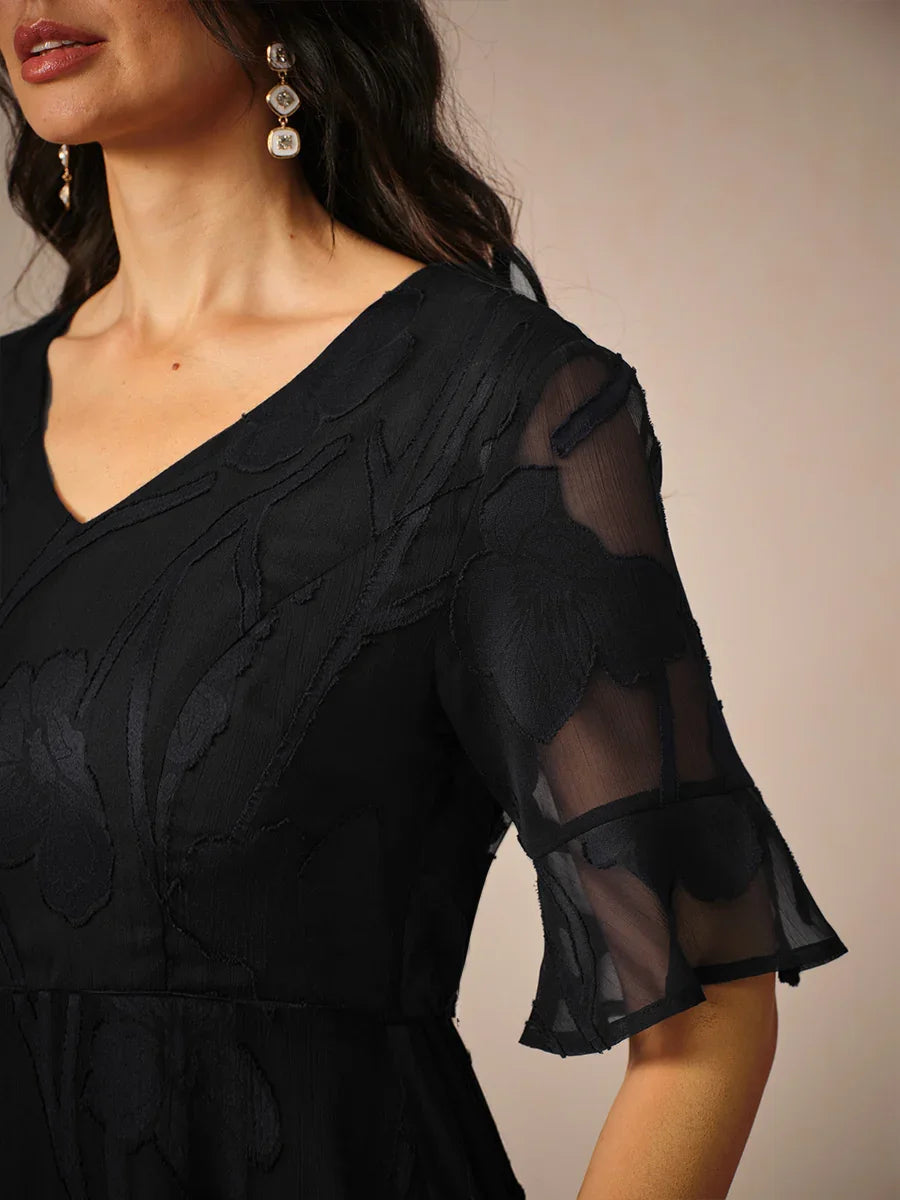 Maxikleid mit Rüschen und flatternder Spitze