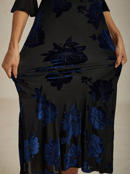 Maxikleid mit Rüschen und flatternder Spitze