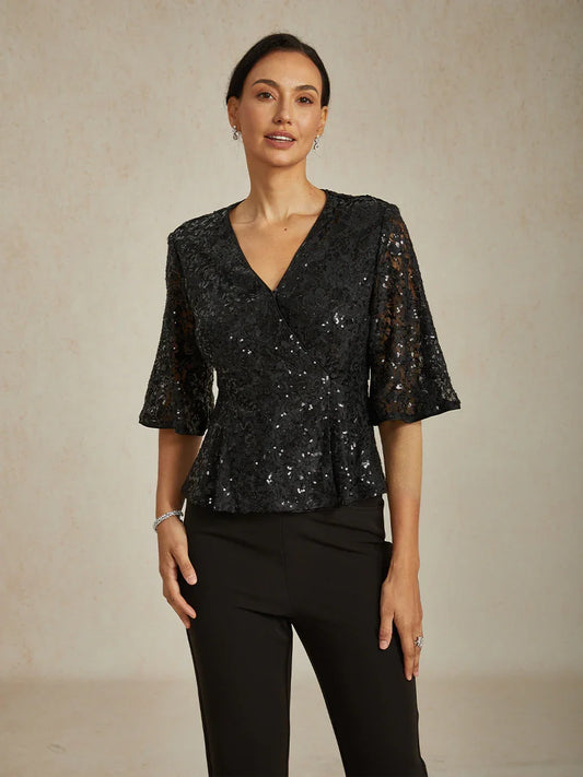 Elegantes Spitzentop mit Fledermausärmeln
