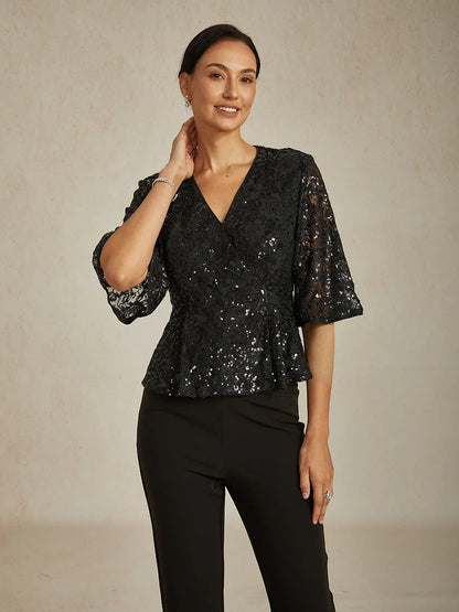 Elegantes Spitzentop mit Fledermausärmeln