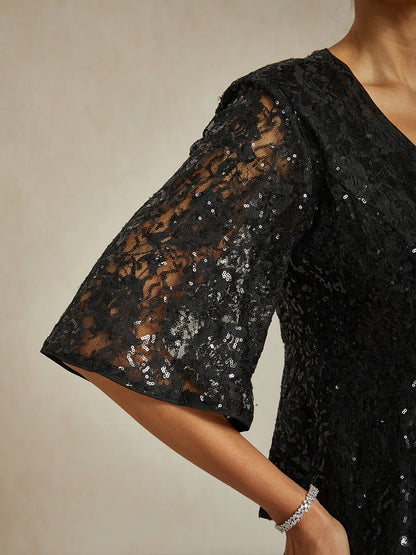 Elegantes Spitzentop mit Fledermausärmeln